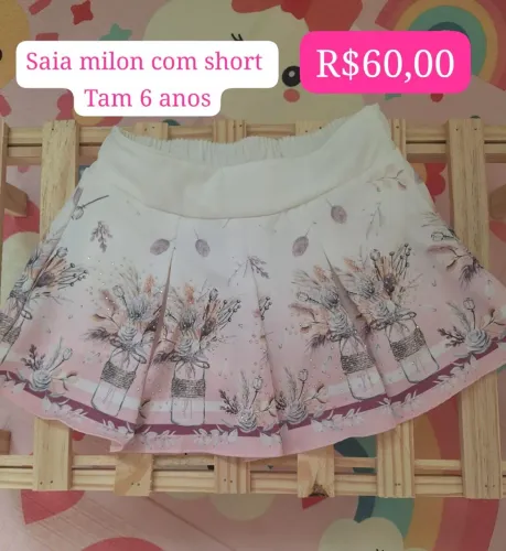 Saia com short marca milon nova tamanho 6 anos vendo por 60,00