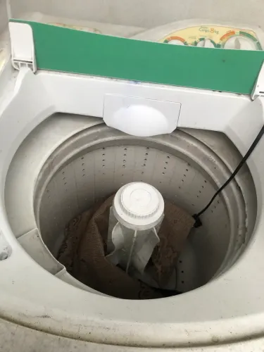 Máquina de lavar roupa usada