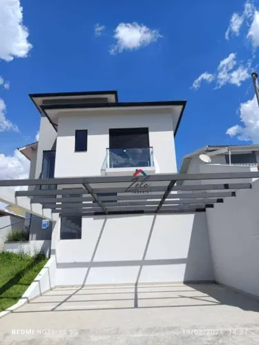 Casa com 3 dormitórios à venda, 190 m² por R$ 950.000 - Condomínio Chacur - Várzea Paulist