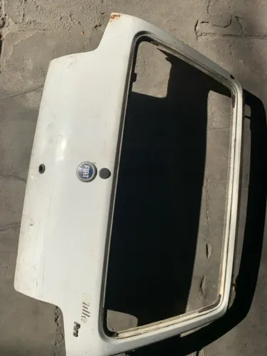 Tampa de mala fiat uno 