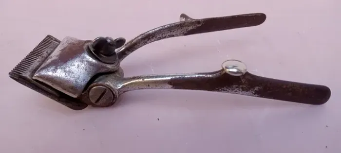 Máquina antiga de cabelo John Oster