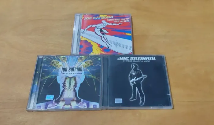 3 CDs Joe Satriani - Engenho de Criação, Surfando com o Alienígena e Música Bonita Estranh