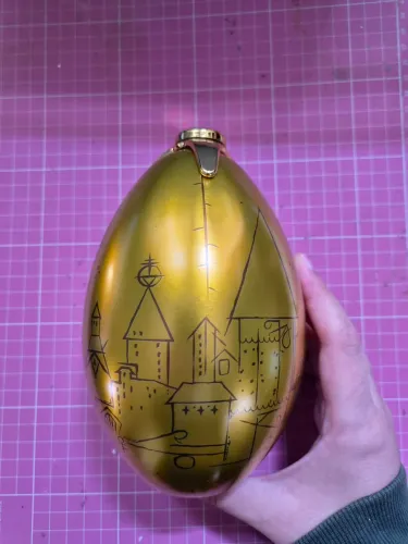 Lata ovo dourado cacau show Harry Potter