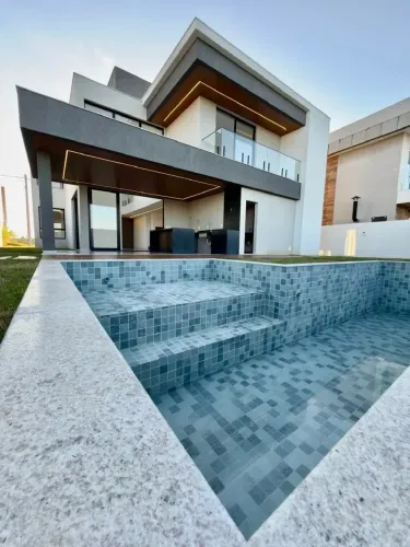Casa à venda com 4/4 em condomínio. Alphaville litoral norte- Bahia