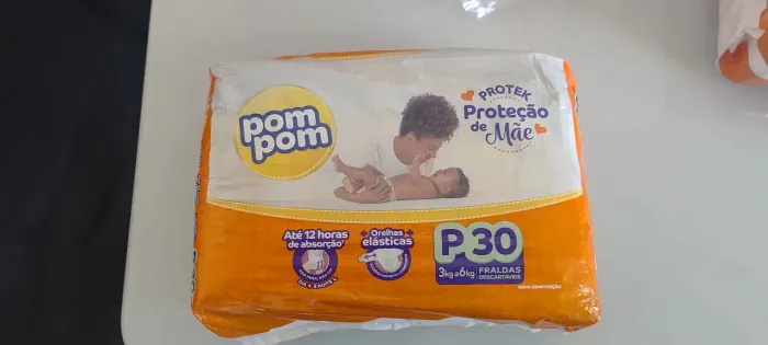 Fralda pompom tamanho P com 30 fraldas.