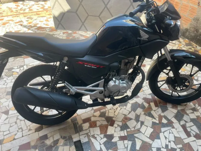 Vendo moto nova