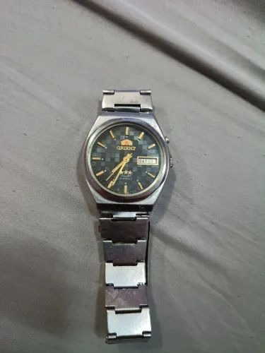 Relógio Orient automático fundo preto