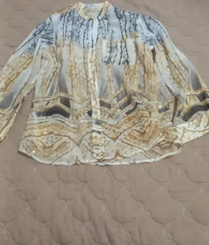 Blusa tamanho P manga longa transparente usada.