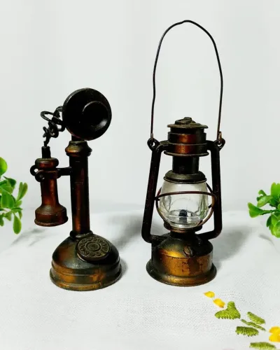 Antigos Apontadores Lampião e Telefone.