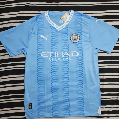 Vendo ou troco camisa Manchester City por um tênis / leia a descrição