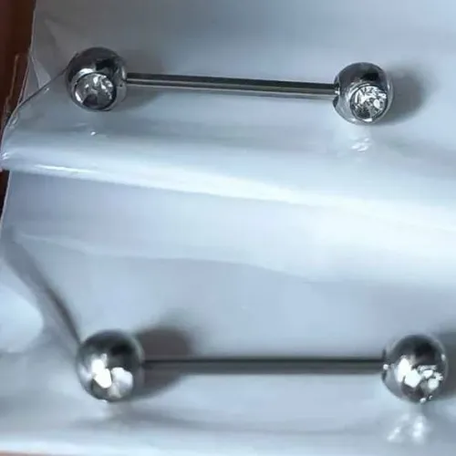 Piercing mamilo ponto de luz 