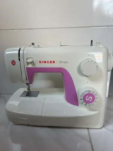Máquina de costura singer