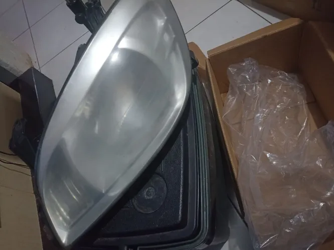 Bloco farol Chevrolet Celta 
