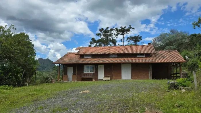 Terreno com casa frente para a SC 370