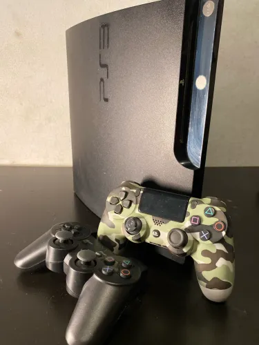 PlayStation 3 + 2 controles originais + vários jogos