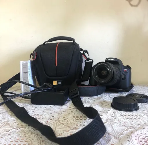 Canon T100