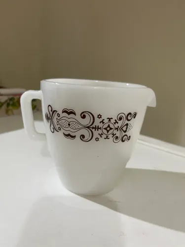 leiteira antigo da marca Colorex, com o padrão de decoração