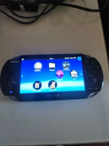 Psvita com marcas de uso 4gb com jogos apenas carregador e console