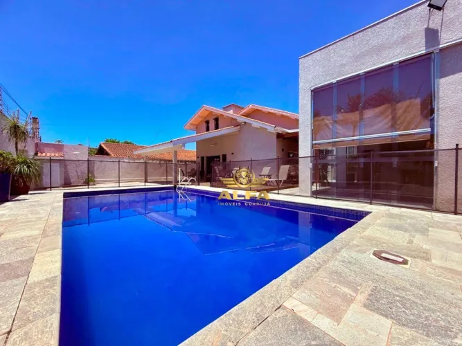 Casa com piscina, área gourmet e 6 dormitórios a uma quadra do mar na Praia da Enseada Al