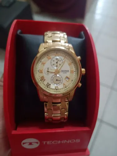Relógio , banhado a ouro,resistente a água. Bem conservado