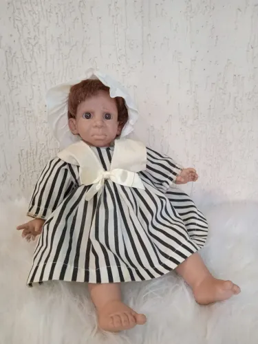 Bom neca baby Face dos anos 70, item para colecionadores, com a sua carinha de malcriada!!