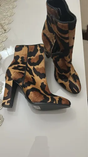 Bota shutz , estampa leopardo, nova, número 35.
