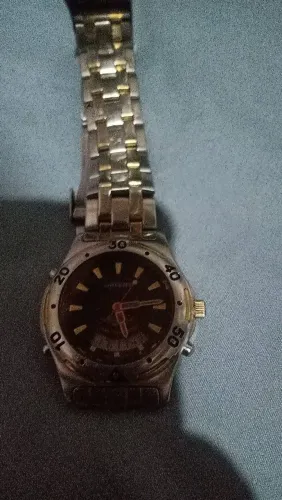 Relógio Orient digital e ponteiro 300.00 reais