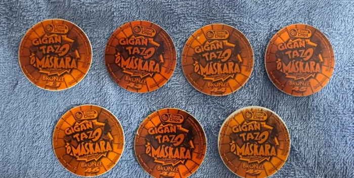 LOTE 2 - COM 7 GIGAN TAZOS O MÁSKARA BRONZE ELMA CHIPS 1998 SEM REPETIÇÕES