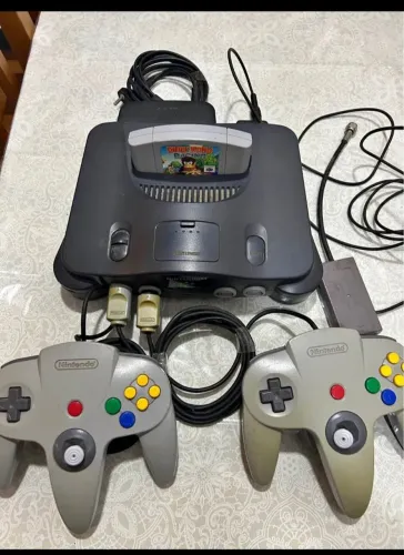 Nintendo 64 2 manetes funcionando perfeitamente jogo original todo original 
