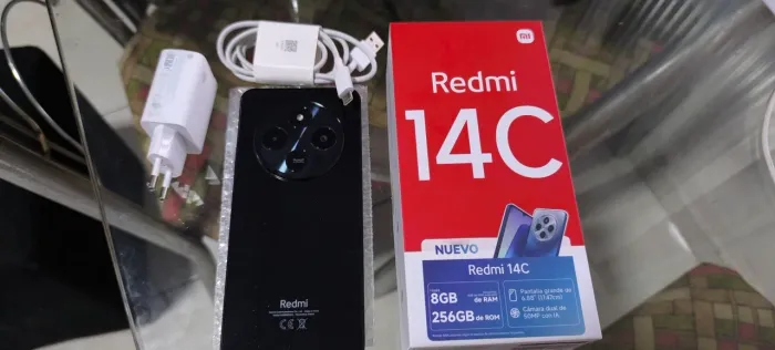 Vendo ou troco por inferior com volta sua REDMI 14 c 256 gb 12 ram biometria e NFC