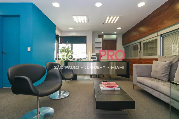 Sala comercial ampla com 3 banheiros, ar condicionado, mobiliada, duas vagas!!!!