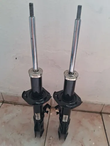 02 amortecedores dianteiros do versa ou march nissan 