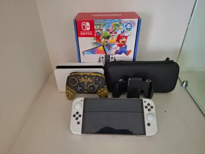 Switch Oled com 9.500 reis em jogos(50 jogos),Pro Controller,Na caixa,Bolsa,Capinha,Pelícu