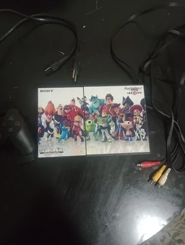 Vendo Playstation 2 original, porém está somente com o leitor travado, e está conservado.