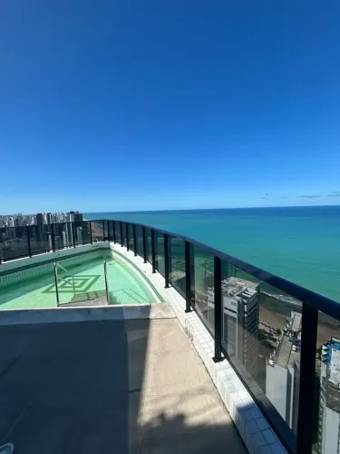 Apartamento 60m, novo, andar alto, vista mar, com 2 quartos 1 sendo suíte, próximo a praia