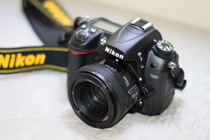 Nikon D7000 + Lente 50mm Extremamente bem cuidada