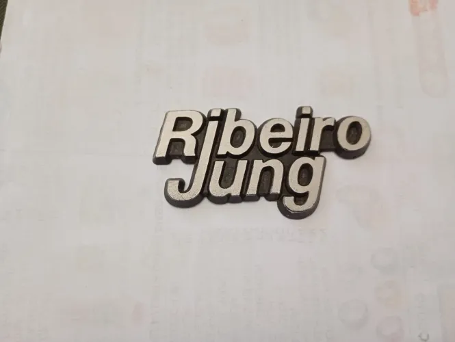 Emblema ribeiro Jung concessionária Ford 