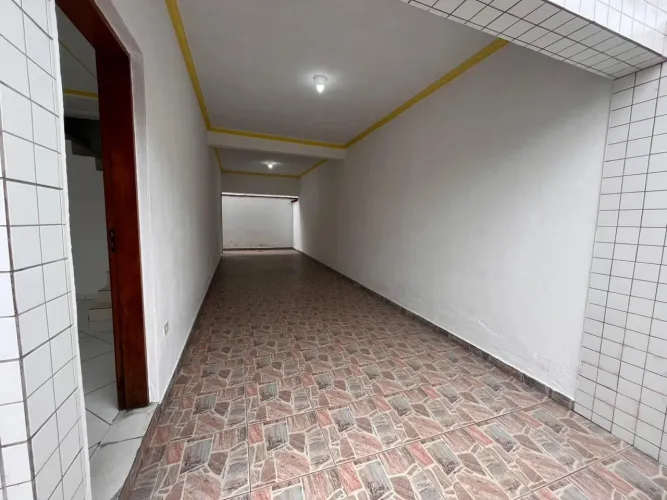 Sobrado com 3 dormitórios para alugar, 110 m² por R$ 3.100,00/mês - Tupi - Praia Grande/SP