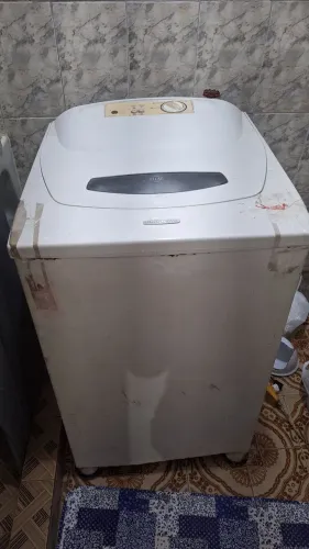 Máquina de lavar com defeito