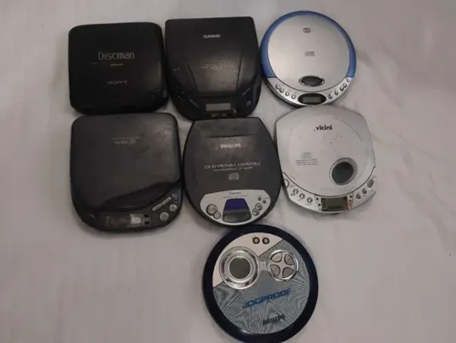 LOTE : DISCMAN´S NO ESTADO E PRA RETIRADA DE PEÇAS E OU CONSERTO .