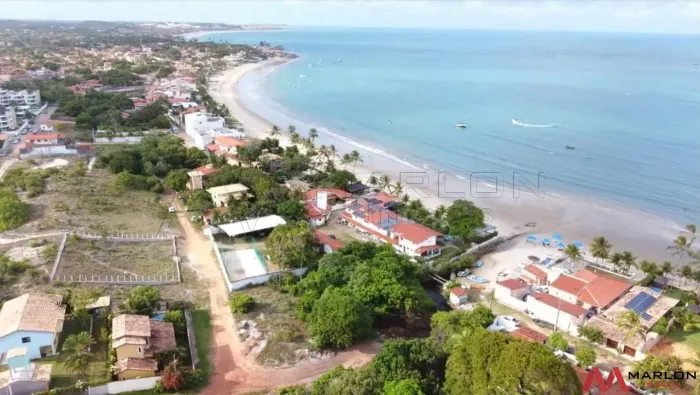 Terreno em Praia de Muriú, murado, frente para o rio, com visão para o mar, 2.000m².