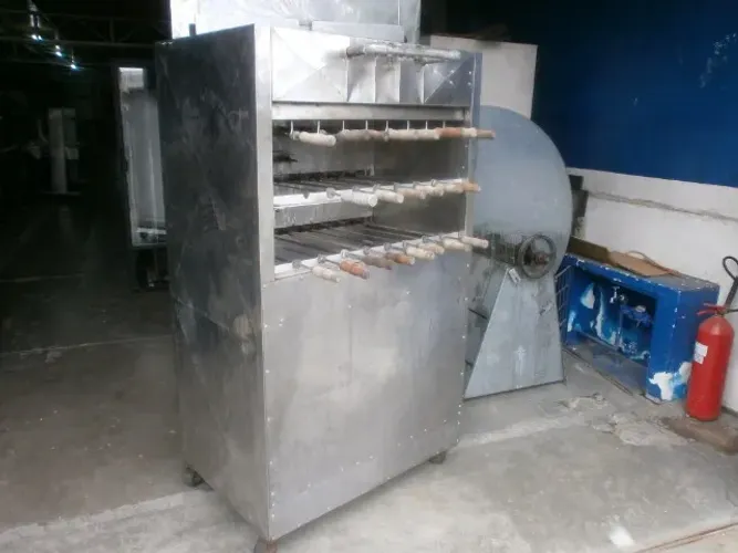 churrasqueira em inox á gás - e a carvão (adaptação ) - com 23 espetos rotativos
