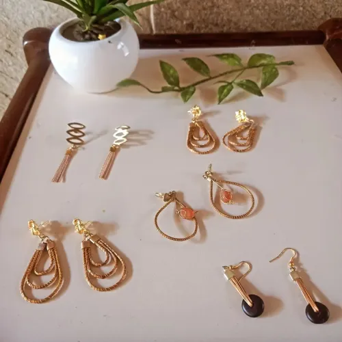 Brinco capim dourado