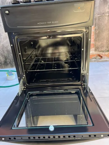 Vendo fogão quatro bocas de vidro,eletrico funcionando perfeitamente forno perfeito 