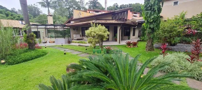 Casa, 332 m² - venda por R$ 2.800.000,00 ou aluguel por R$ 16.732,82/mês - Parque das Ciga