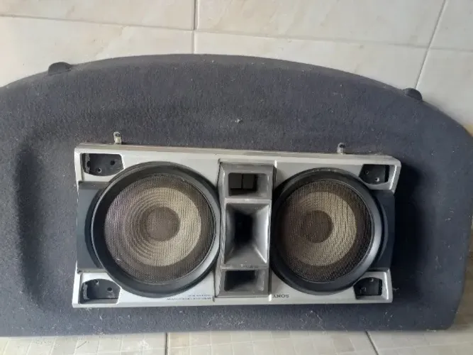tampão do astra hatch com altofalantes 99