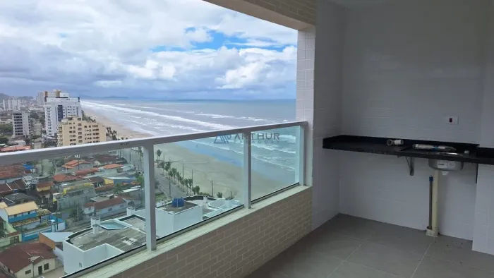 Apartamento à venda em Mongaguá com sacada gourmet e vista mar