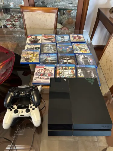 PS4 fat 500GB + 15 jogos + 2 controles originais + carregador de controles