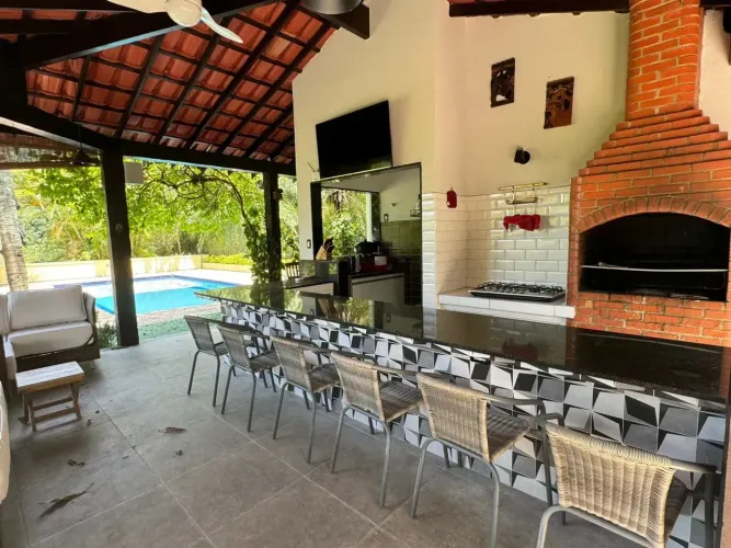 Casa de condomínio para venda com 697 metros quadrados com 5 quartos