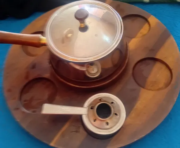 Aparelho de fondue com tábua giratoria